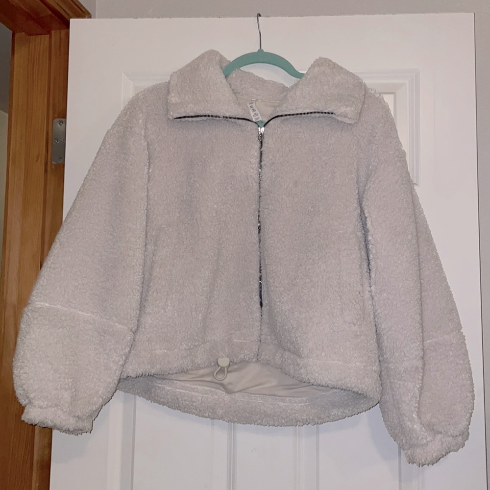 Lululemon cream colored teddy jacket.